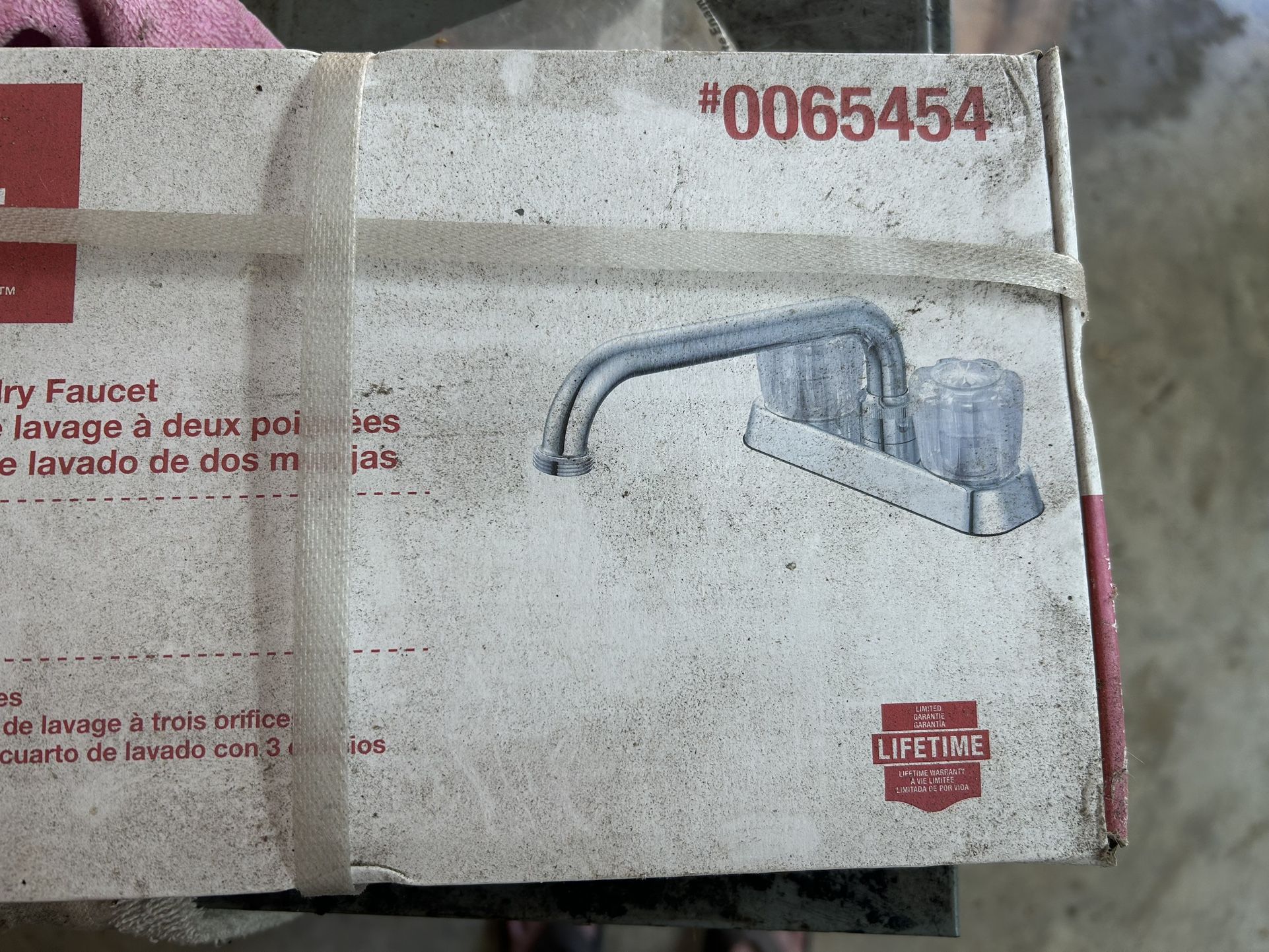 Laundry faucet new in the box