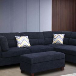103.5"W Black Fabric Sectional Sofa with Right Facing Chaise, Storage Ottoman, and 2 Accent Pillows