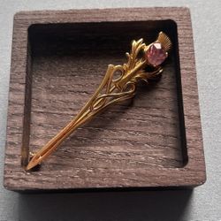 Gold Tone Brooch With Purple Rhinestone