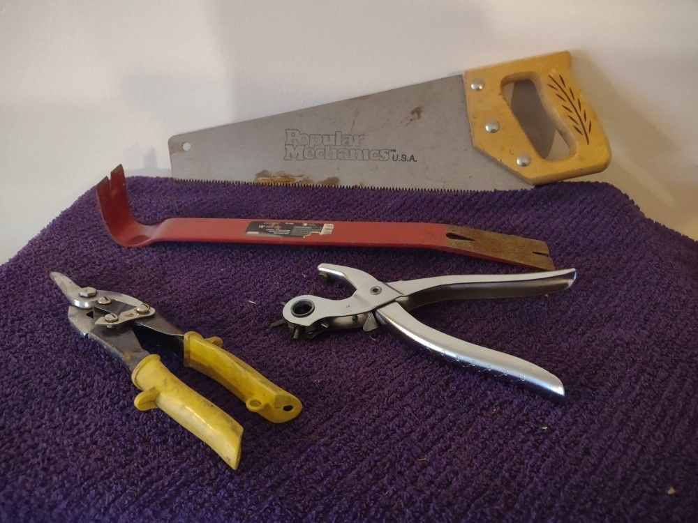 Handsaw, Leather Puncher, Pry Bar, And Cutters