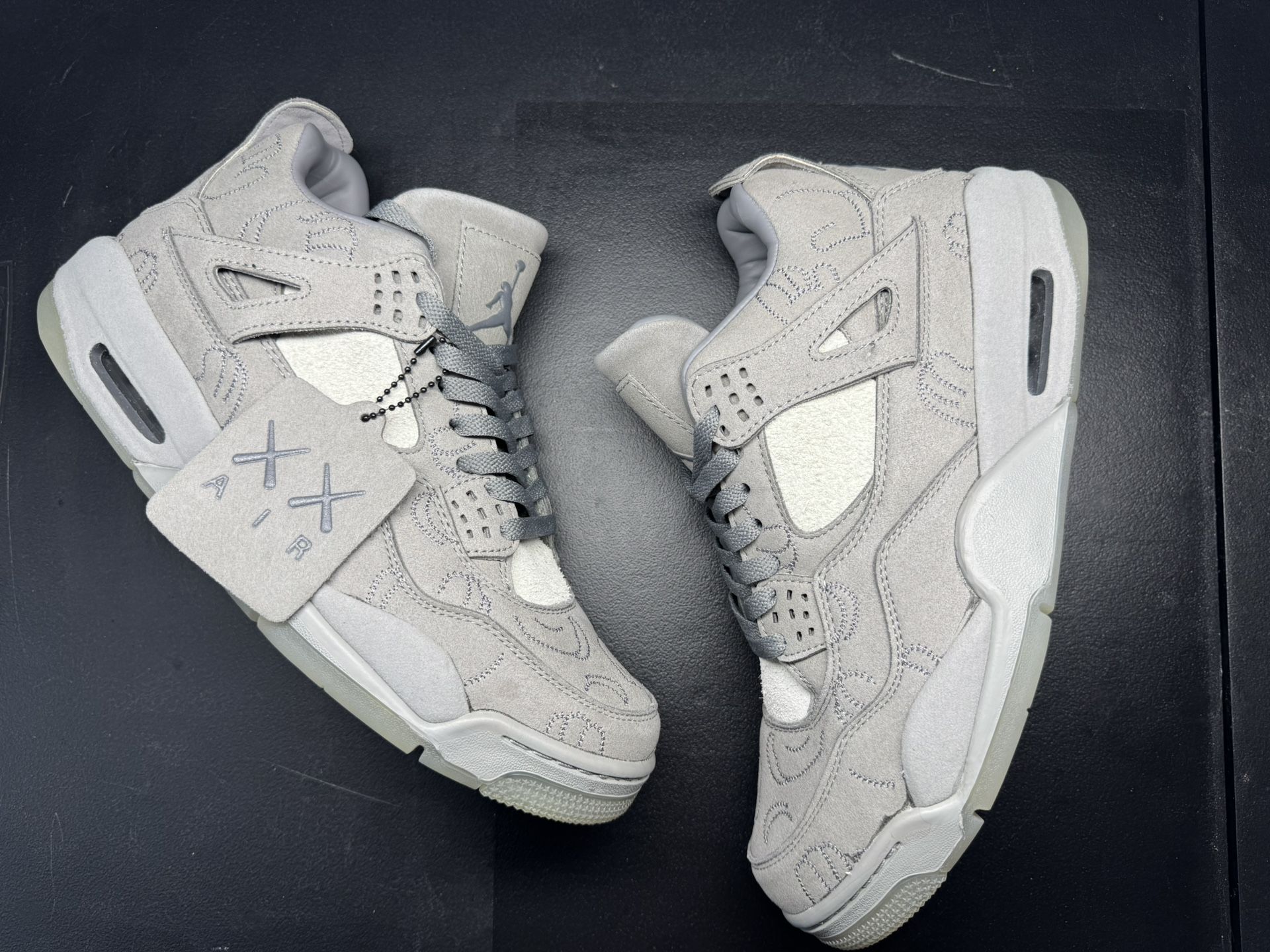 Air Jordan 4 Retro x KAWS “Cool Grey”