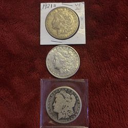 3- Morgan silver dollars