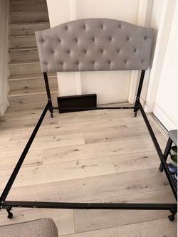 Metal bed frame functions for full and queen mattress with grey back board