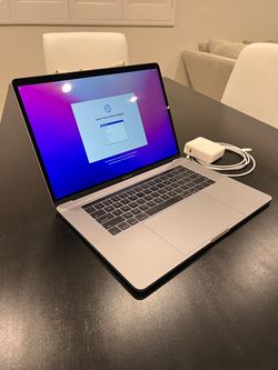 Apple MacBook Pro 15" (Late 2016) Touch Bar – Quad i7 / 16GB / 1TB SSD / Radeon Pro