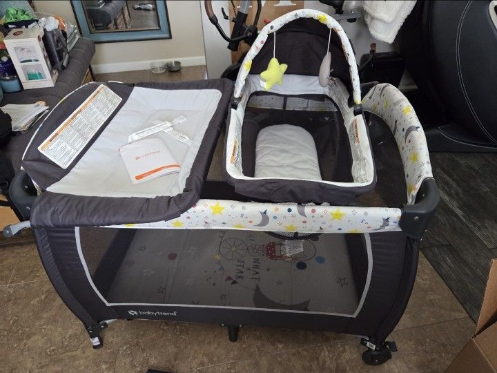Play Pen , Changing Table , Bassinet Combo. Baby Trend