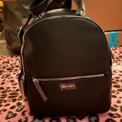 Brand New Nine West black backpack 