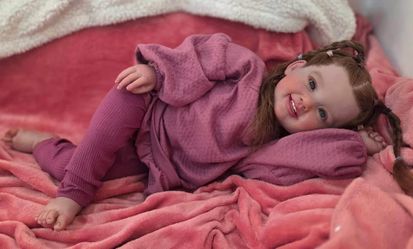 A lifelike reborn baby for adoption