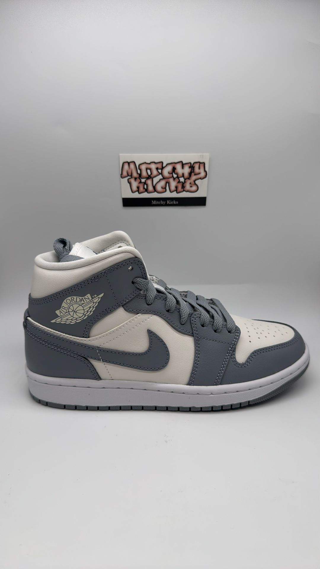 Jordan 1 Mid Stealth (Women’s) Sz. 7w