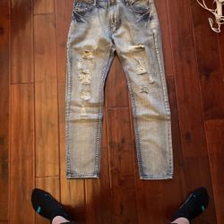 BLUE RIPPED JEANS