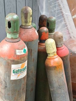 Gas Cylinders of varying sizes. Both full and empty cylinders are available. 