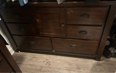 Dark Wood Dresser with Multiple Drawers
