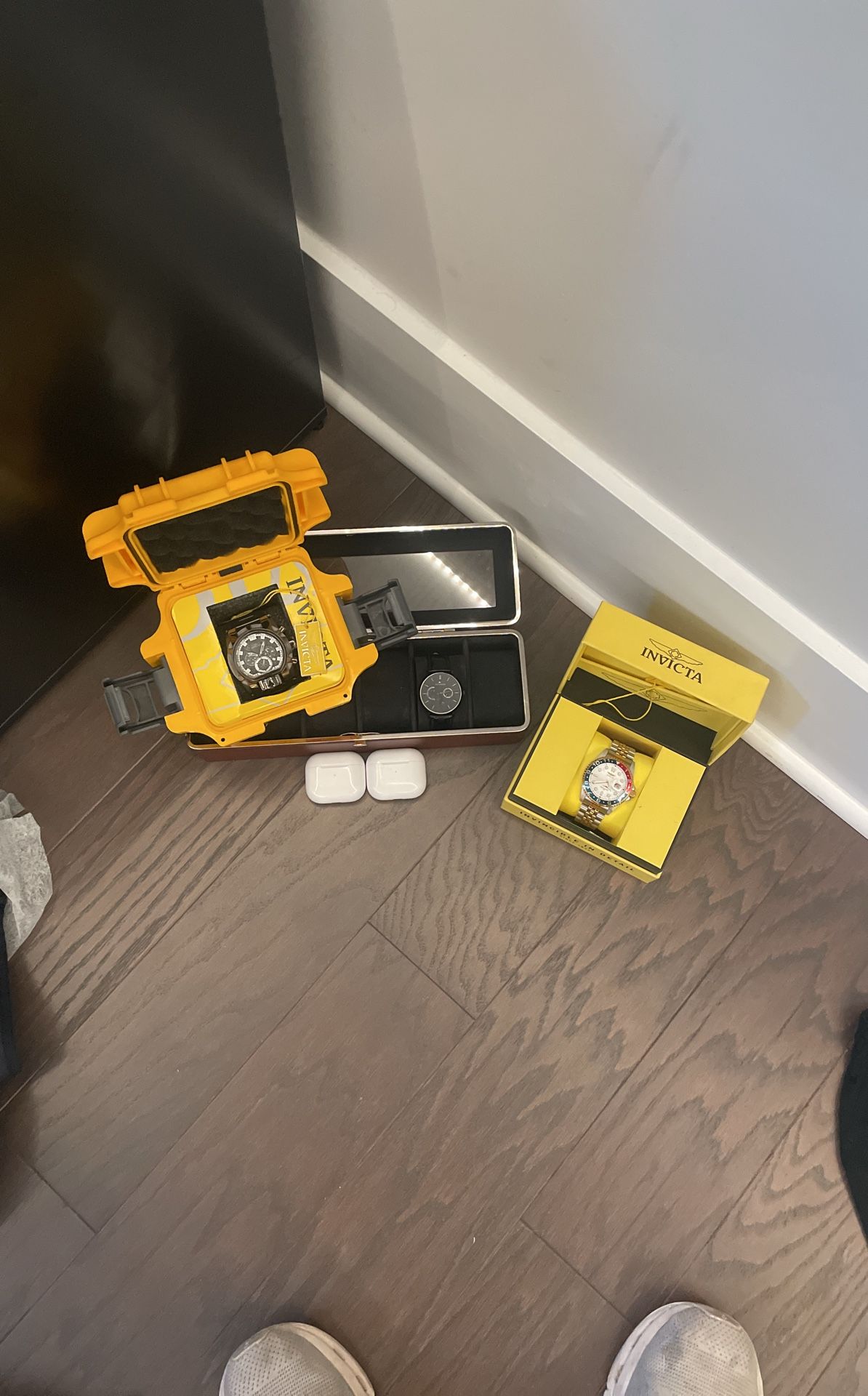 Three Watches And Two AirPods