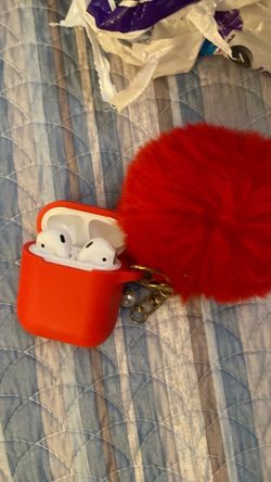 Air pods in red case
