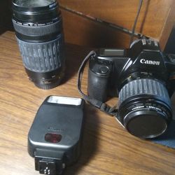 Canon EOS rebel Camera With flash And Zoom Lense
