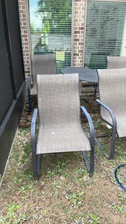 Backyard iron table and 4 chairs