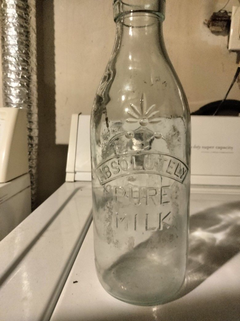 Antique. Milk. Bottle