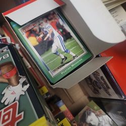 lot of baseball cards, football cards, basketball cards