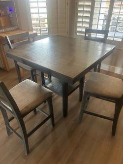 Dining room table with four chairs