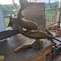 Brass Swimming Dolphins