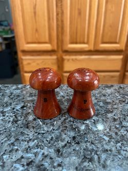 Vintage Wooden Souvenir Wyoming Pair of Salt and Pepper Shakers. Size approximately 2 1/4 inches tall. Preowned has some minor scratches. Never us