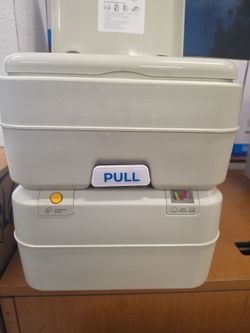 Portable toilet new in box