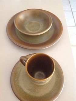 Set of 8 plates, bowls,mugs and small plates