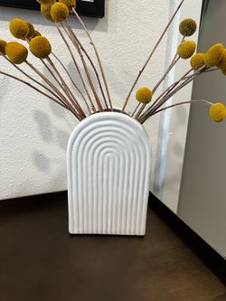 White rolling greens vase