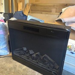 LOW PRICE MOVING- $800 RETAIL ELECTRIC FIRE