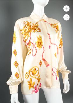 Whimsical lion king printed silk shirt by Escada.