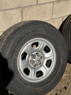OEM Nissan Frontier rims/tires