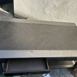 Ashley Signature Cocktail Table With Lower Shelf and Two Drawers 