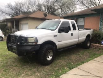 2002 f350 lariat 4x4 long bed (goose neck)
