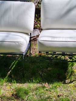 2 outdoor metal chairs selling both for 65