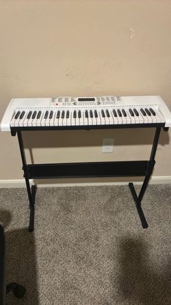 Electric piano comes with chair