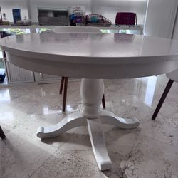 Crate and Barrel round table extendable