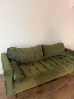 green velvet sofa