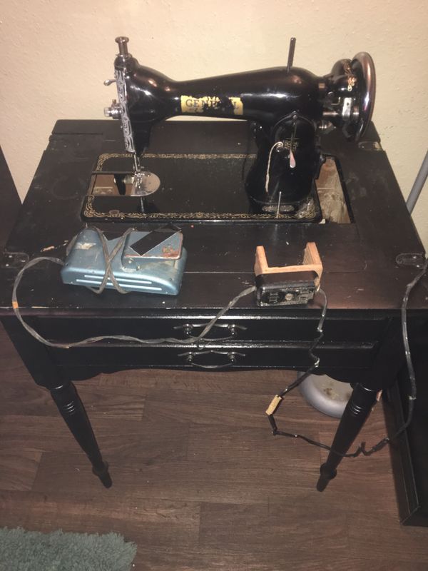 Sewing machine with table and foot pedal. for Sale in San Antonio, TX