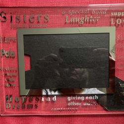 Like New, Heavy Glass Sisters Frame. Sits on Table or Shelf. Holds 4” by 6” Photo.