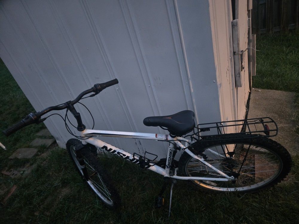 Men's White "16 XC Performance Mountain Bike. Very little use. One tune up. New tubes. 26 X 2.10 size tires.