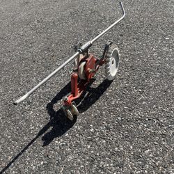 Thompson Traveling tractor sprinkler