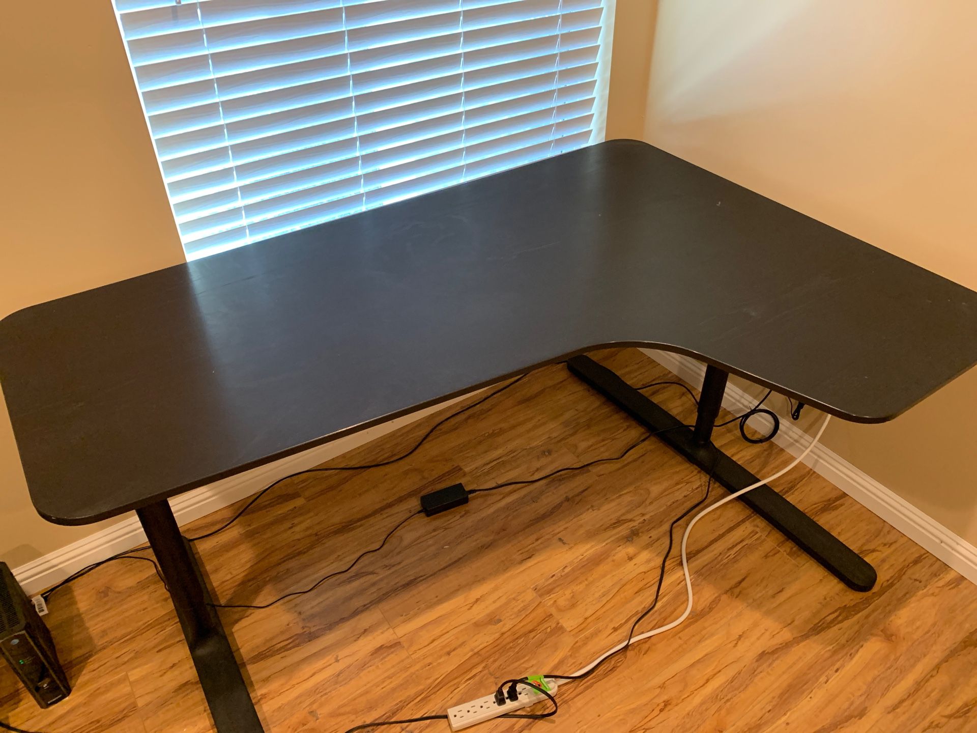 Corner desk 63inch wide corner 43 inch it’s adjustable high