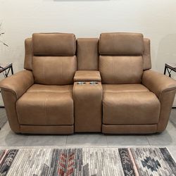 Leather loveseat recliner.  Zero gravity, heat and massage