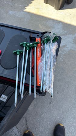 Camping Tent Holding Metal Nails and Hammer