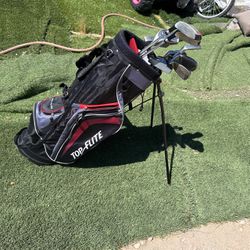 A Set Of Golf Clubs With Golf Bag