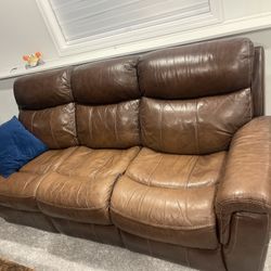 Three piece dual power reclining sofa, Brown Three seater 