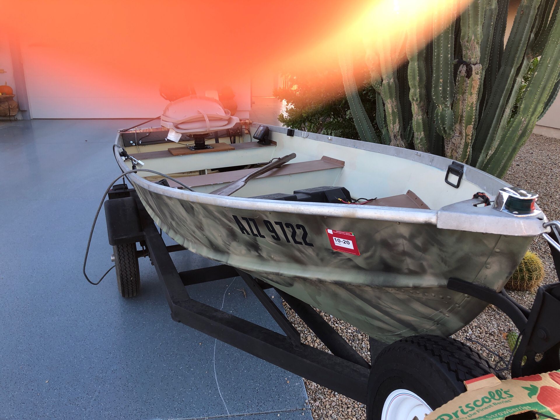 12’ aluminum boat with 5hp mercury motor, electric trolling motor, fish finder, trailer and cover