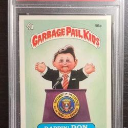 1985 Garbage Pail Kids #46a RAPPIN’ RON -Schizo Fran Checklist - Glossy - PSA 7