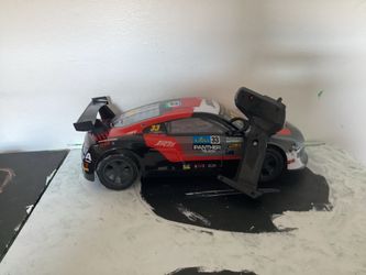 Rc race car comes with the rc car and the rc controler
