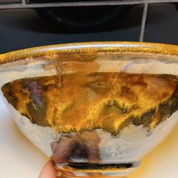 Amazing piece of hand thrown pottery. Highly glazed signed bowl