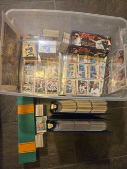 Huge tote of sports cards. Baseball basketball football